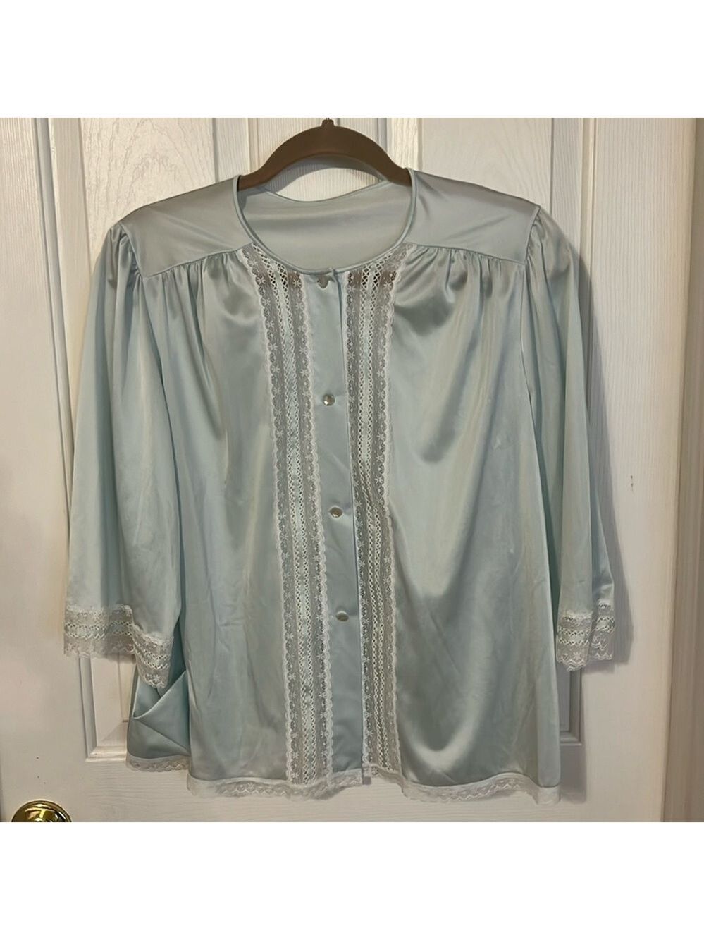 Shadowline vintage bed jacket. Pastel blue with lace embellishments. Size Med.